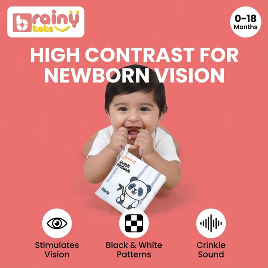 Baby exploring the BrainyTots High Contrast Jungle Cloth Book from the Sensory Storytime Kit, supporting visual development, sensory stimulation, black-and-white pattern recognition, and early learning for babies 0–18 months.