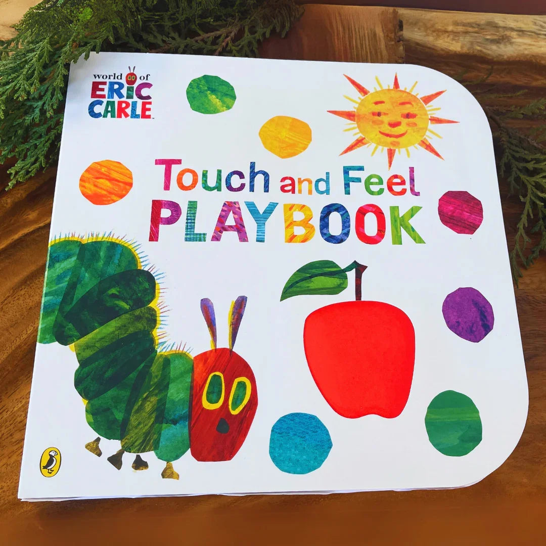 BrainyTots Touch and Feel Playbook from the Sensory Storytime Kit featuring interactive textured pages that encourage tactile exploration, sensory development, language learning, and early literacy for babies 0–18 months.