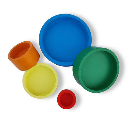 Colorful wooden nesting and stacking bowls in varying sizes, illustrating educational and versatile play options for young children.