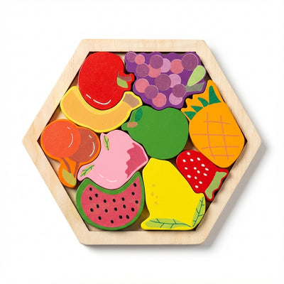 Hexagonal wooden puzzle with colorful fruit-shaped pieces on a white background