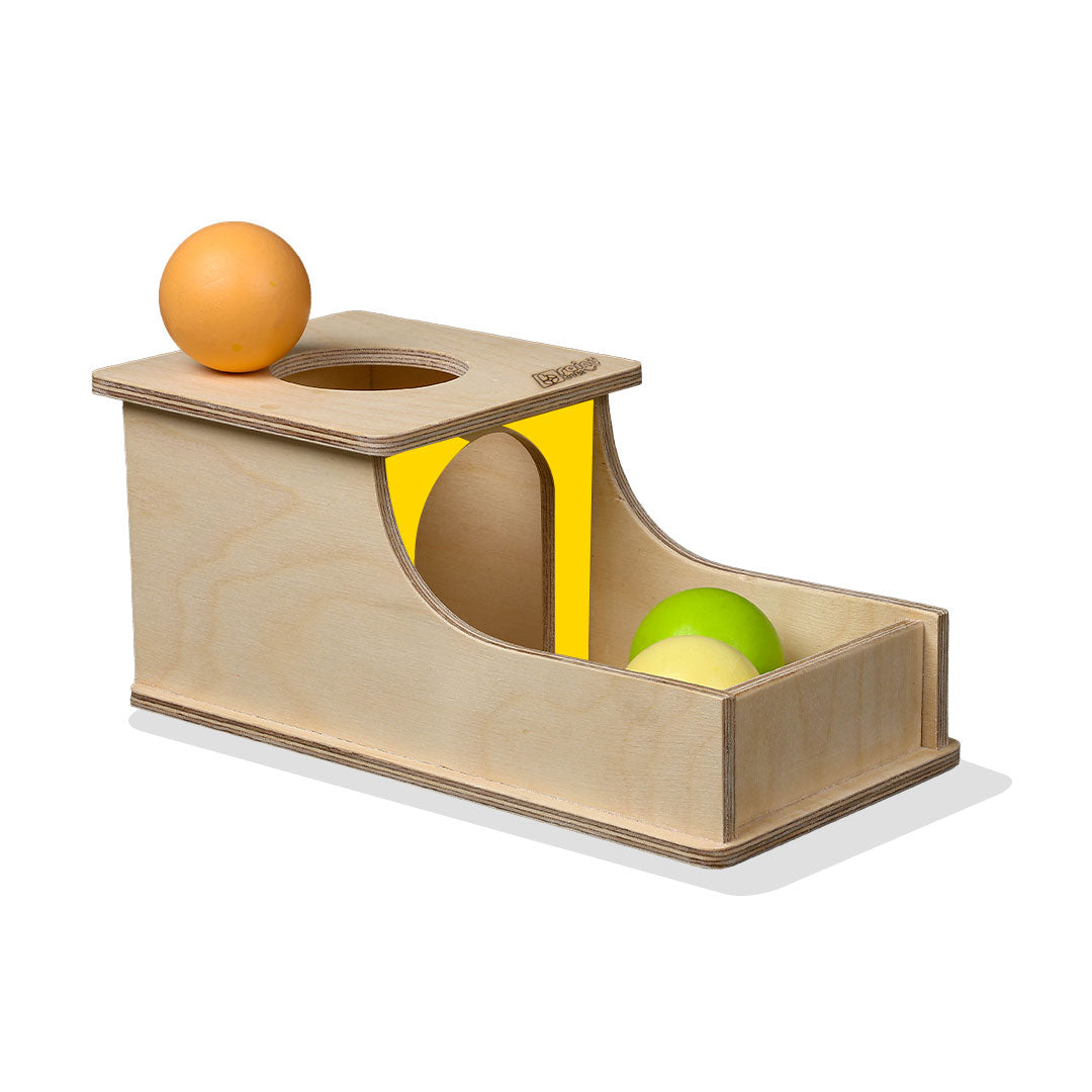 Meta Description: Elevate your baby's learning with our Object Permanence Box, designed for babies aged 6 months and up. This engaging toy teaches object permanence through interactive play with 3 colorful balls. Crafted from durable wood, it enhances hand-eye coordination and improves both fine and gross motor skills. Discover developmental toys at BrainyTots.com.