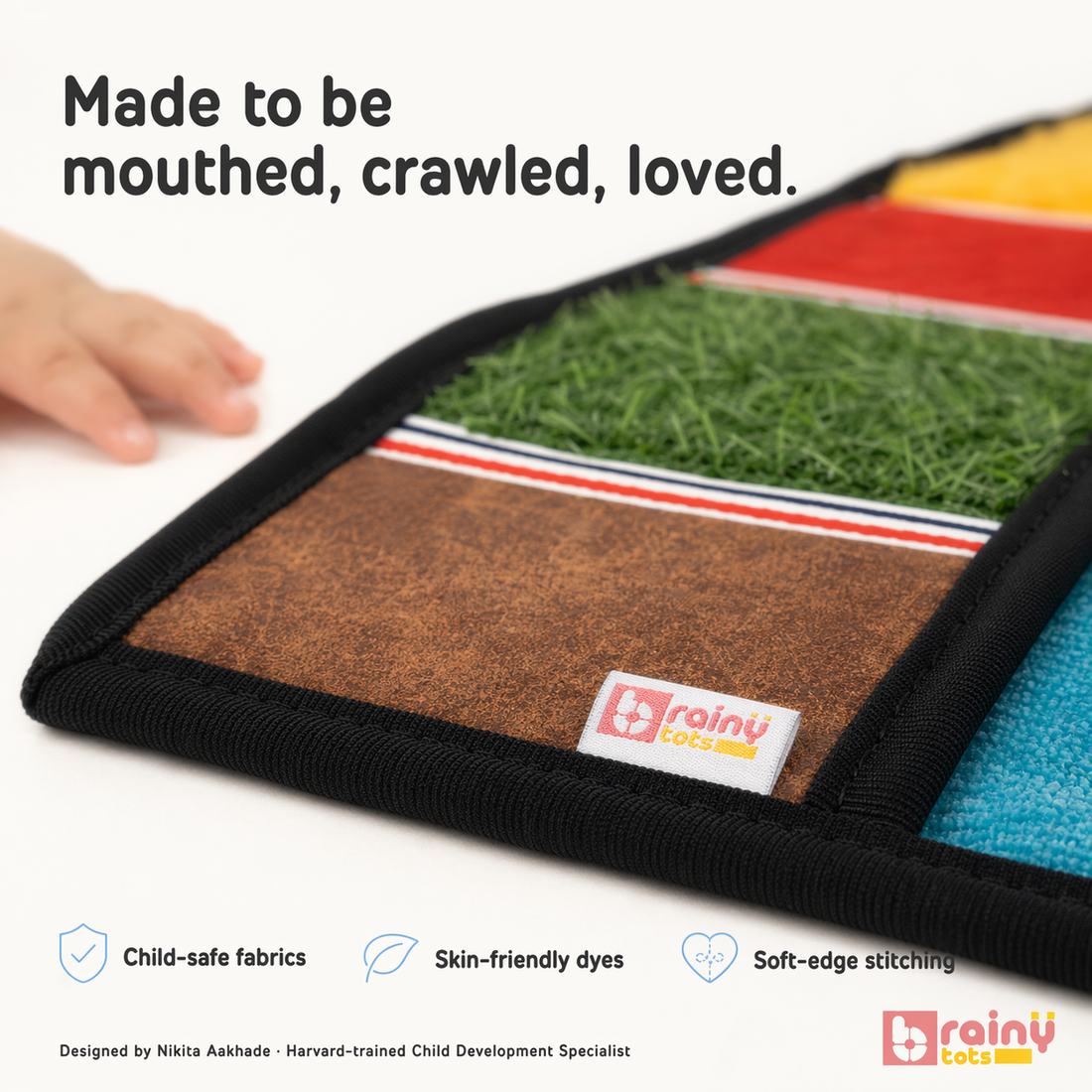Close-up of the BrainyTots logo and high-quality stitching on the Sensory Texture Mat, featuring child-safe fabrics, skin-friendly dyes, and soft-edge stitching for safety