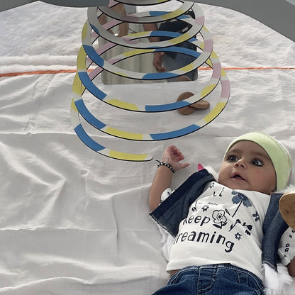 Our Wooden Play Gym features a spiral hanging mobile, perfect for visual stimulation and sensory development. This Montessori toy, ideal for babies aged 0-12 months, encourages reaching, grasping, and motor skills. Safe, sturdy, and engaging for early learning and exploration.