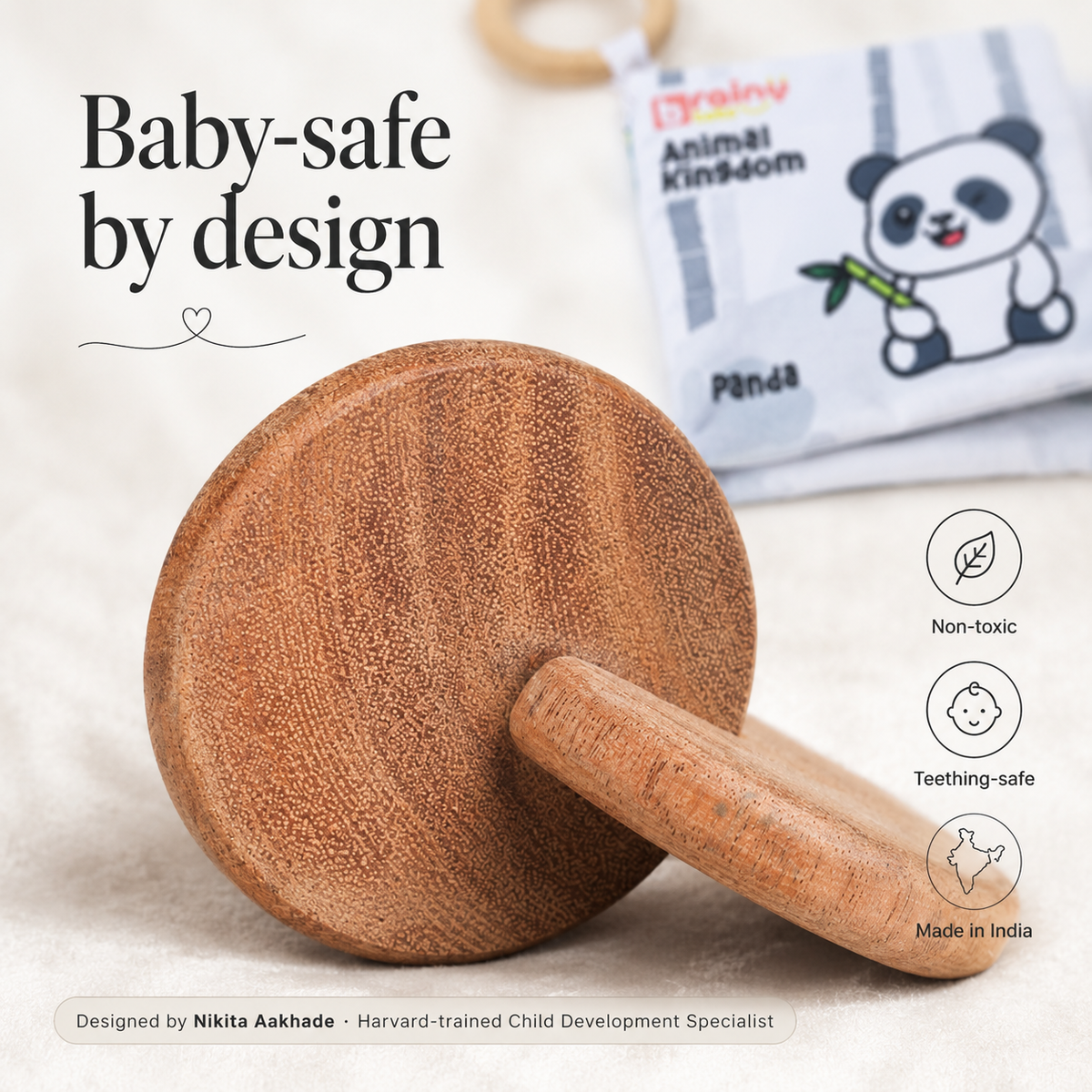 BrainyTots wooden baby toys for early grasping and sensory play, featuring smooth rounded pieces designed for small hands.