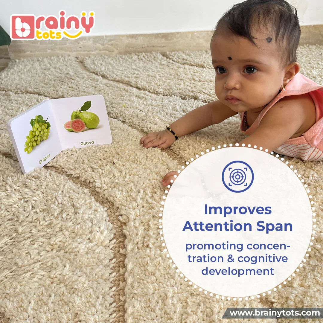 Baby engaging with the BrainyTots Alphabet & Number Board Book featuring large, colorful fruit illustrations that improve attention span, encourage visual focus, and support cognitive development for babies aged 3+ months.