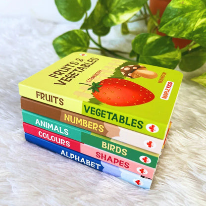 BrainyTots Baby's First Books Set featuring five durable board books for babies 3+ months, designed to build early vocabulary, language development, visual learning, and a lifelong love for reading.