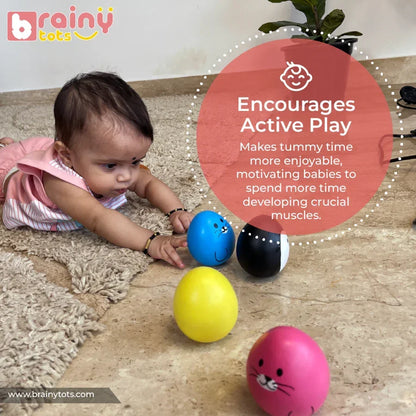 Baby reaching for the BrainyTots Montessori Balancing Wobbler during tummy time, encouraging active play, core muscle development, sensory exploration, and cause-and-effect learning for babies 0–12 months.