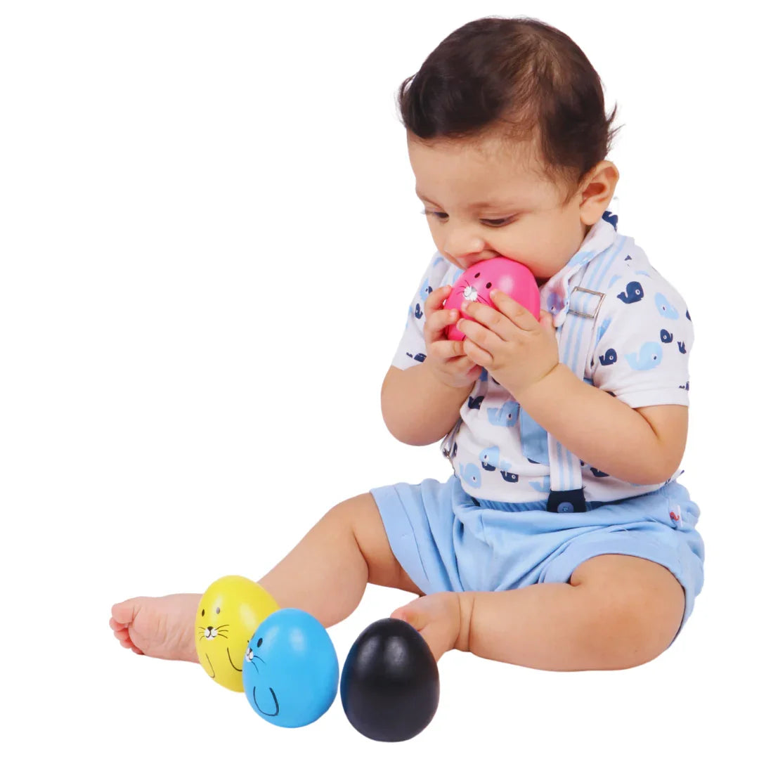 Baby exploring the BrainyTots Montessori Balancing Wobbler through hands-on and sensory play, encouraging independent exploration, cause-and-effect learning, and early motor development for babies 0–12 months.