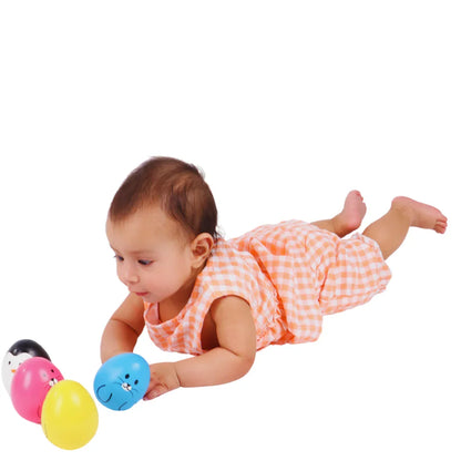 Baby enjoying tummy time with the BrainyTots Montessori Balancing Wobbler, reaching for wobbling toys to encourage visual tracking, core strength, sensory exploration, and early motor development for babies 0–12 months.