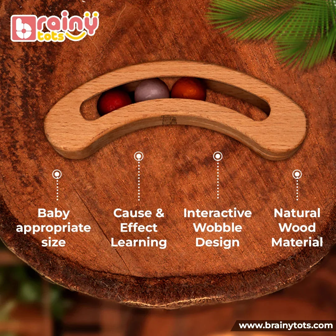 BrainyTots Montessori Banana Busy Beads Rattle featuring a baby-friendly size, interactive wobble design, natural wood construction, and colorful moving beads for hands-on sensory play.