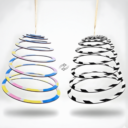 BrainyTots Dual-Sided Spiral Hanging Mobile featuring a high-contrast black-and-white side for newborn visual development and a colorful side for older babies. This Montessori-inspired wooden baby mobile encourages visual tracking, concentration, curiosity, sensory exploration, and calmness for babies aged 0–6 months