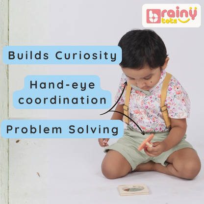 Child playing with the BrainyTots wooden Circle Shape Puzzle, practicing hand-eye coordination, problem-solving, and curiosity through hands-on play.