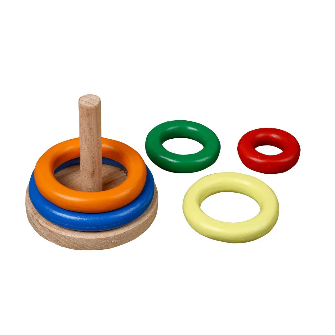 BrainyTots Wooden Ring Stacker with colorful detachable wooden rings and natural wooden base, encouraging babies aged 6–24 months to explore grasping, color recognition, size sequencing, fine motor skills, hand-eye coordination, and independent Montessori learning through hands-on play.