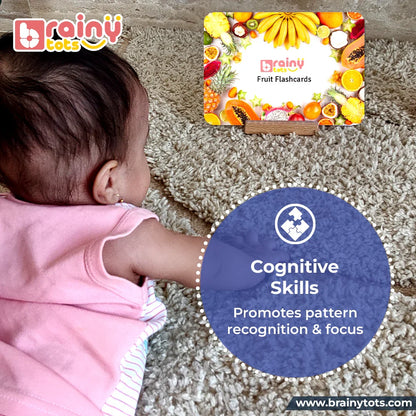 Baby exploring the BrainyTots Flash Cards Kit of 8 Sets with fruit flashcards that encourage pattern recognition, cognitive development, visual discrimination, and early learning for babies aged 0–24 months.