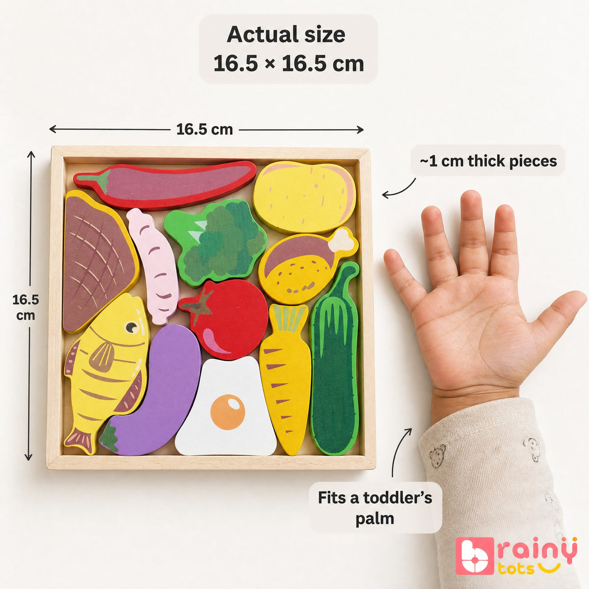 BrainyTots wooden food puzzle measuring 16.5 by 16.5 cm with approximately 1 cm thick pieces, shown beside a toddler's hand.