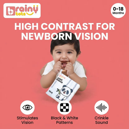 Baby exploring the BrainyTots High Contrast Jungle Cloth Book from the Sensory Storytime Kit, supporting visual development, sensory stimulation, black-and-white pattern recognition, and early learning for babies 0–18 months.