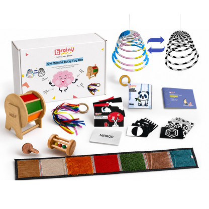 BrainyTots Montessori baby toy box for 0–6 months with sensory, visual, grasping, and cause-and-effect toys.