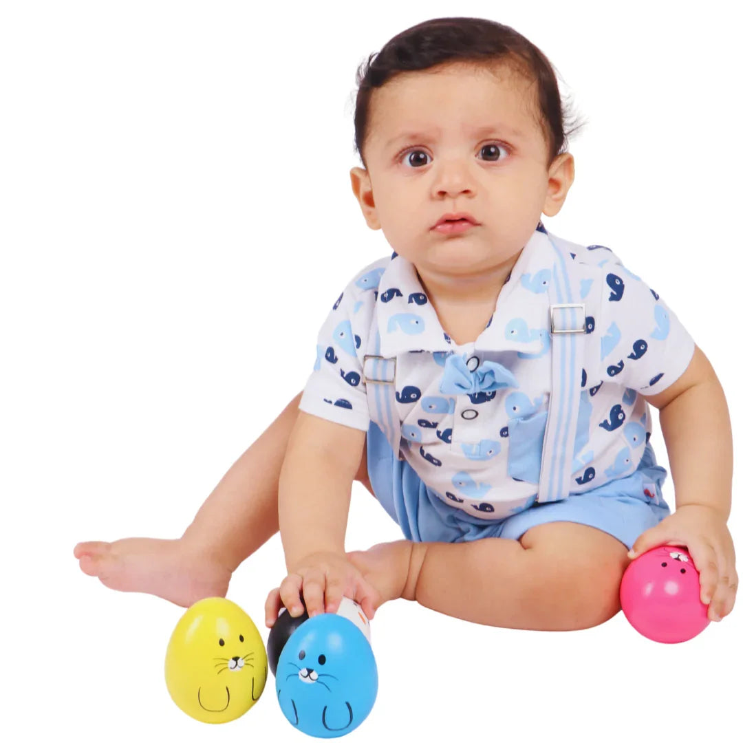 Baby independently playing with the BrainyTots Montessori Balancing Wobbler, encouraging grasping, sensory exploration, fine motor development, and cause-and-effect learning for babies 0–12 months.