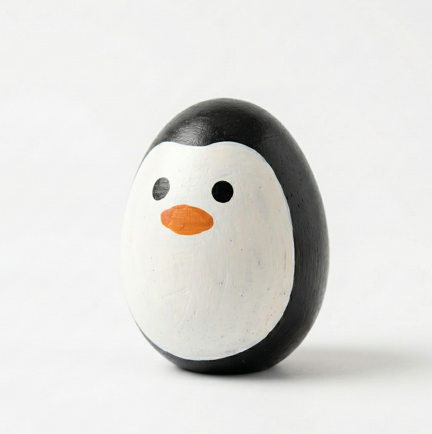 BrainyTots Montessori Balancing Wobbler, a wooden tummy time toy for babies 2–12 months that encourages core strength, cause-and-effect learning, sensory development, and active play through gentle wobbling.