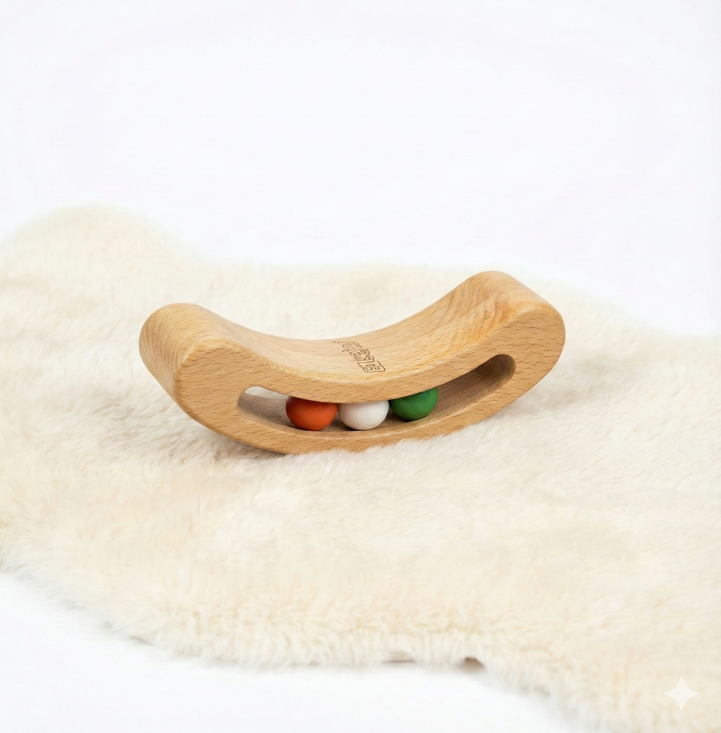 BrainyTots Montessori Banana Busy Beads Rattle made from natural wood, featuring colorful moving beads, a gentle wobble, and soft rattling sounds to encourage fine motor skills, hand-eye coordination, and cause-and-effect learning for babies aged 2–18 months.