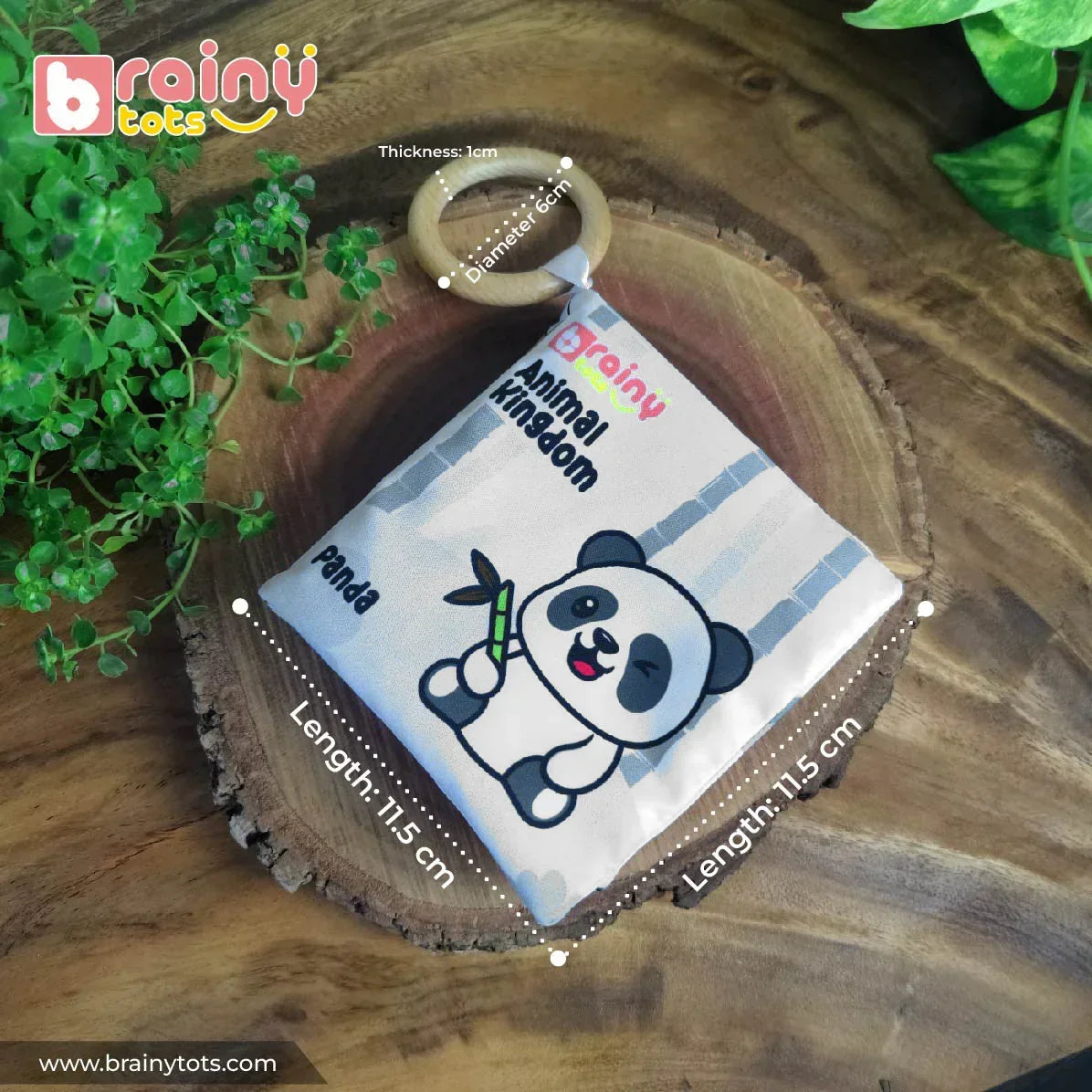BrainyTots Montessori High-Contrast Cloth Book – Early Seeing & Calm Play Book with attached natural neem wood teether, showing product dimensions including an 11.5 × 11.5 cm soft cloth book and a 6 cm diameter teether designed for newborn sensory play and teething relief.
