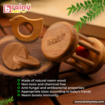 BrainyTots Neem Wood Teether Gift Set featuring a Montessori Rolling Drum Rattle, Interlocking Discs Teether, and Dove Teether made from natural neem wood for safe teething, sensory play, and early development.