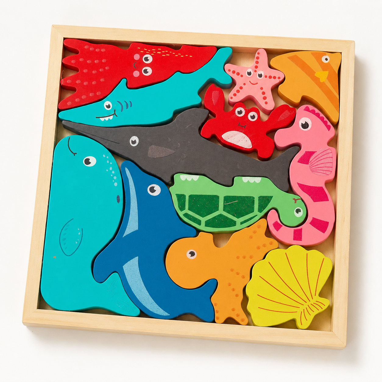 BrainyTots Montessori Sea Animals Square Puzzle with 12 wooden ocean animal pieces designed to develop spatial reasoning, fine motor skills, problem solving, hand-eye coordination, and pretend play for toddlers.