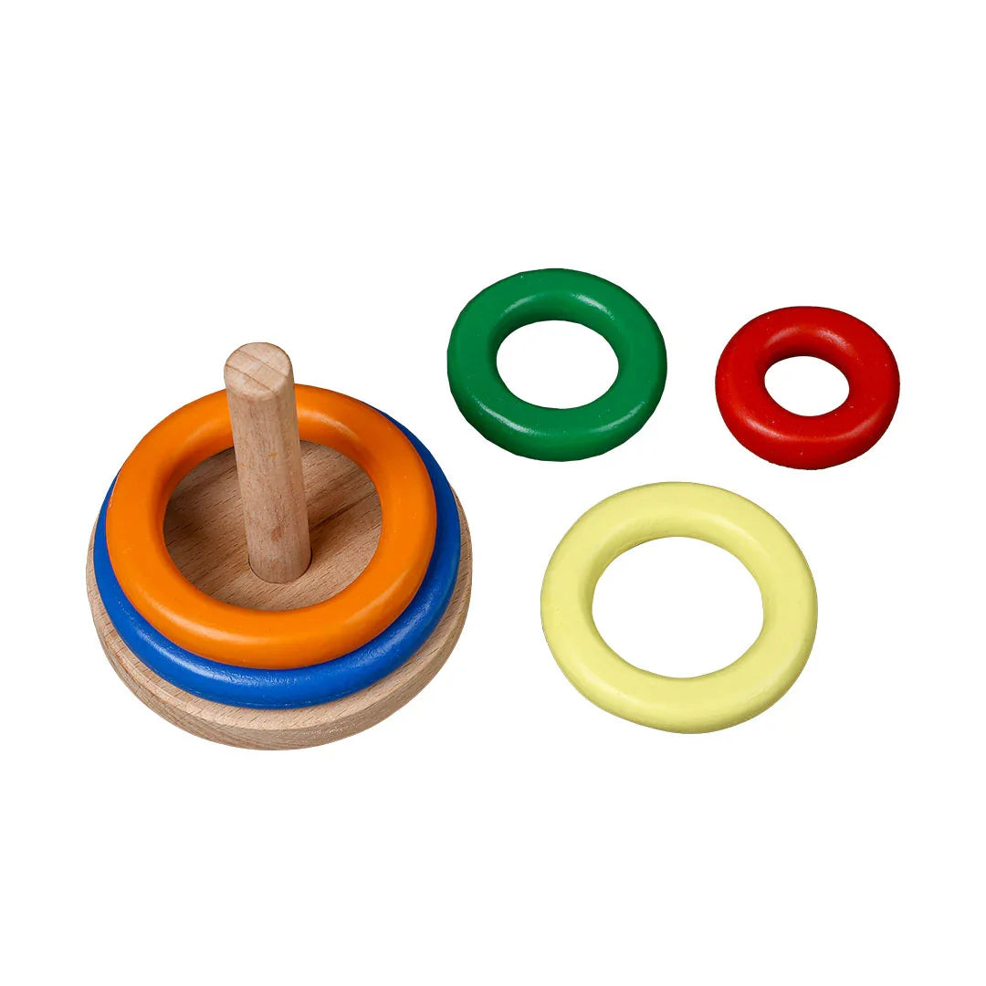 BrainyTots Wooden Ring Stacker showing removable colorful stacking rings and wooden base, designed for babies aged 6–24 months to develop grasping skills, color recognition, size differentiation, sequencing, and problem-solving through Montessori-inspired play.