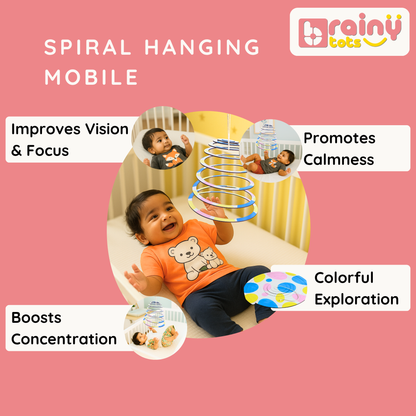 Baby watching the BrainyTots Spiral Hanging Mobile suspended above a crib, encouraging visual tracking, focus, concentration, calmness, and colorful sensory exploration. This Montessori-inspired dual-sided mobile supports healthy visual development and curiosity for newborns and babies aged 0–6 months.