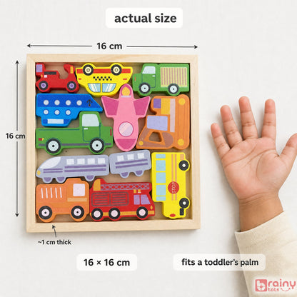 BrainyTots wooden vehicle tray puzzle measuring 16 by 16 cm with approximately 1 cm thick vehicle pieces, shown beside a toddler's hand.
