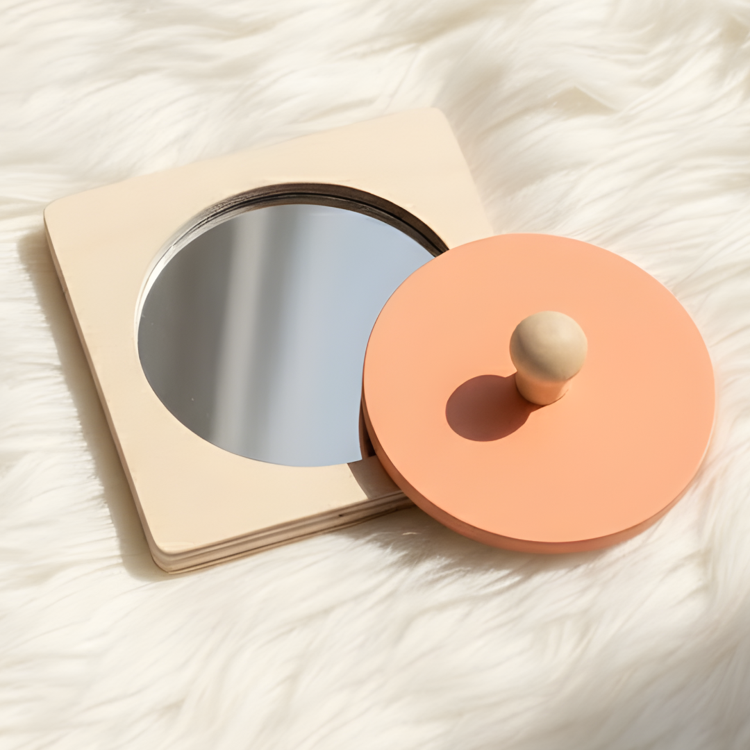 BrainyTots wooden circle shape puzzle with removable grasping piece and built-in mirror, designed for early problem-solving, fine motor skills, and self-recognition.