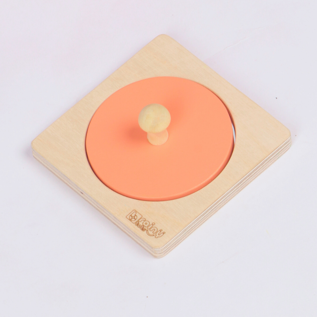 BrainyTots wooden Circle Shape Puzzle with removable circular piece, easy-grip knob, and built-in mirror for babies.