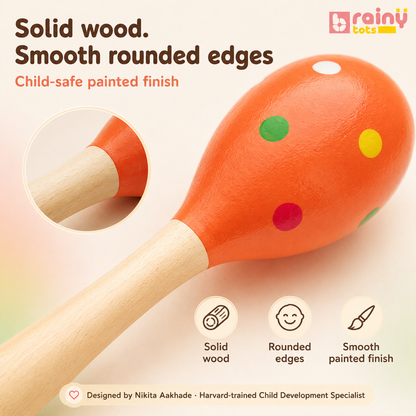 Close-up of the BrainyTots Montessori Wooden Egg Shaker featuring solid wood construction, smooth rounded edges, and a child-safe painted finish for safe sensory play and early learning for babies aged 0–18 months.