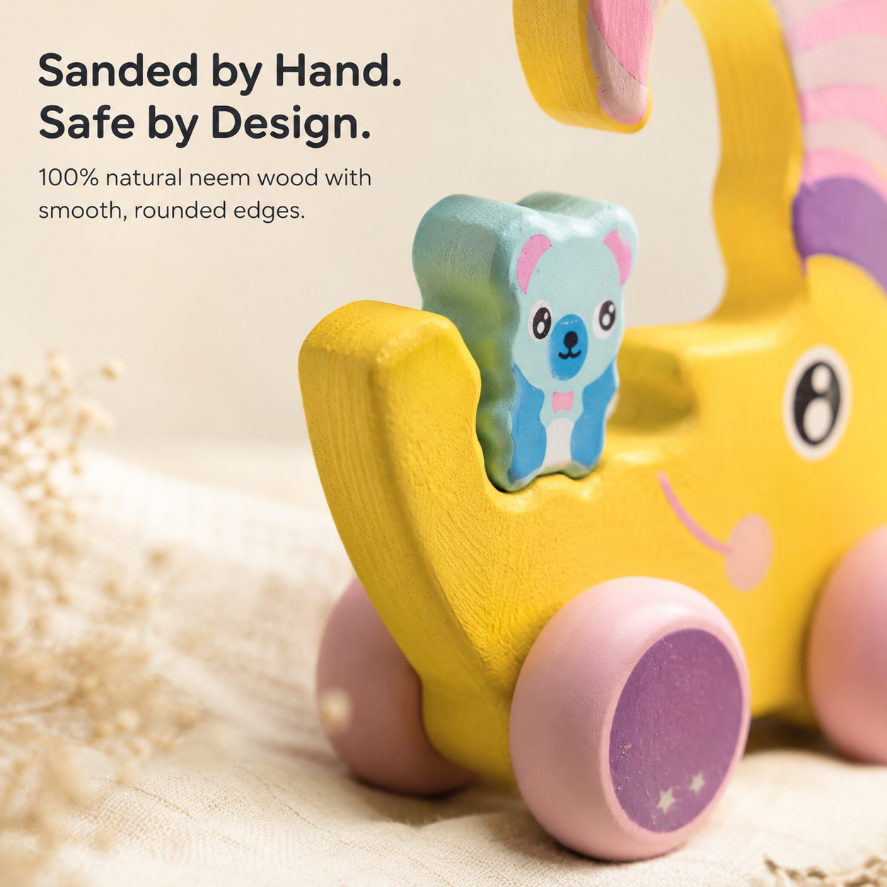 Close-up of the BrainyTots Wooden Push & Pull Toy showcasing smooth hand-sanded neem wood, rounded baby-safe edges, durable craftsmanship, and non-toxic water-based paint for Montessori play.