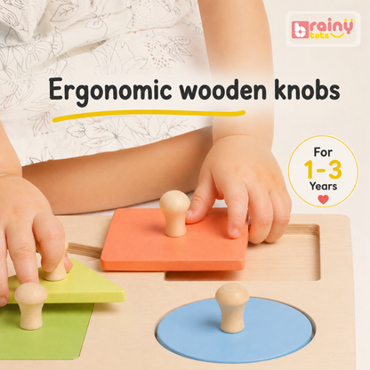 Close-up of BrainyTots wooden shape puzzle pieces with easy-grip knobs for small hands.
