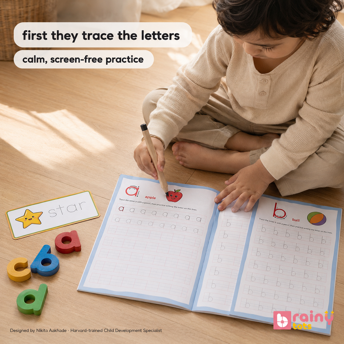 BrainyTots wooden spelling game with illustrated word cards and chunky lowercase alphabet letters for phonics and first-word practice.