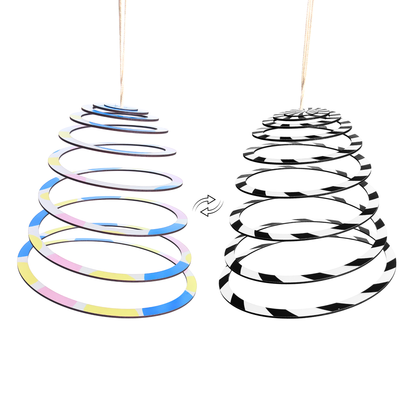 One mobile that grows with your baby. The BrainyTots Dual-Sided Spiral Hanging Mobile begins with high-contrast patterns for newborn vision and transitions to vibrant colors as your baby's eyesight develops, encouraging calm observation, curiosity, and longer attention spans.