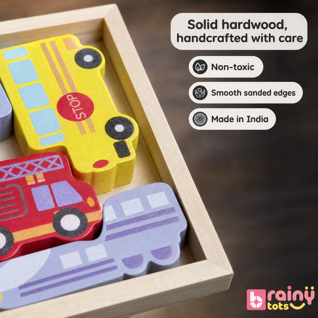 Close-up of BrainyTots wooden vehicle puzzle pieces showing solid hardwood, smooth sanded edges, and a colorful painted finish.