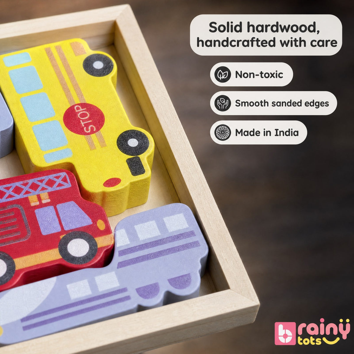Close-up of BrainyTots wooden vehicle puzzle pieces showing solid hardwood, smooth sanded edges, and a colorful painted finish.