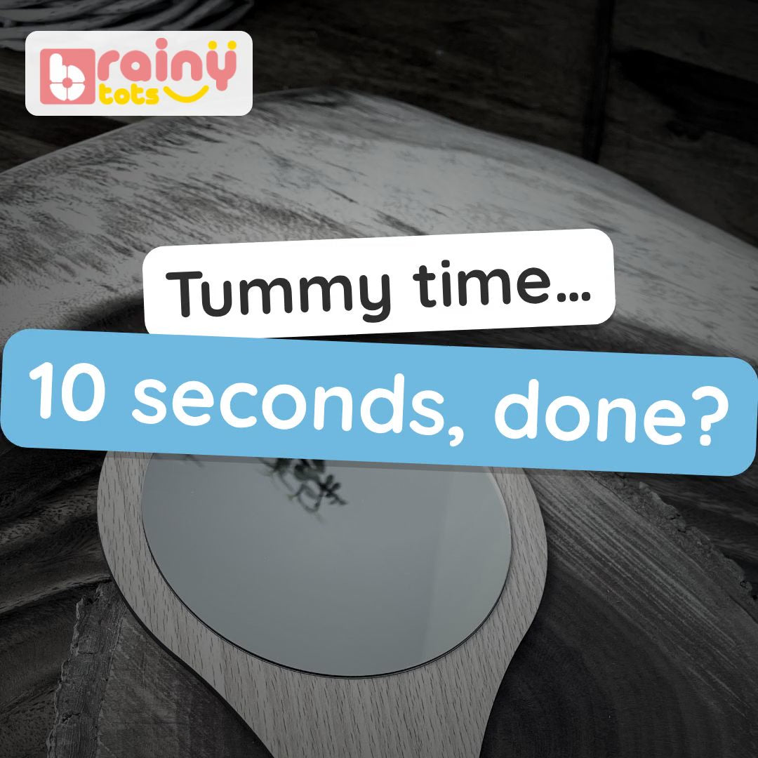 BrainyTots Montessori Hand Mirror video: a baby mirror with a smooth wooden handle, to prop up at tummy time or hold, so a baby can find their own face. Ages 2–12 months.