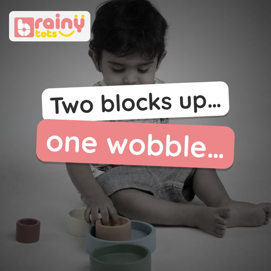 BrainyTots Wooden Stacking and Nesting Bowls video: five colourful bowls nested small into big, then flipped and stacked into a tower. Ages 9–36 months.