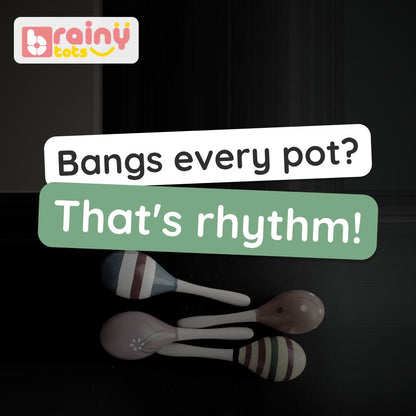 BrainyTots Wooden Shakers video: a pair of hand-painted wooden shakers with a soft rattle and handles sized for a little fist. Ages 12 months+.
