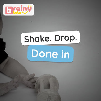 BrainyTots Neem Wood Rolling Drum Rattle video: six bars to grab and shake, beads tumbling inside, then it rolls away for a baby to chase. Ages 2–18 months.