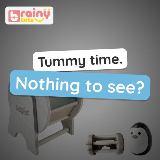BrainyTots Tummy Time Discovery Kit video: rainbow spinning wheel, penguin wobbler and rolling drum rattle that get a baby lifting, reaching and moving. Ages 3–12 months.