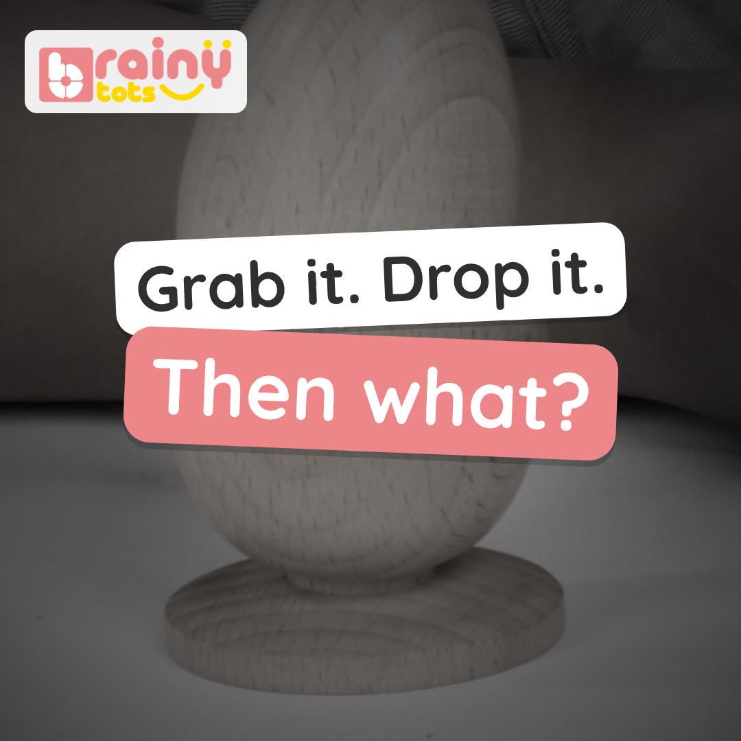 BrainyTots Wooden Egg and Cup video: the beech wood egg lifted out of its cup and dropped back in – a classic first Montessori placing toy. Ages 6–18 months.